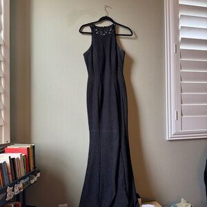 Black sparkly dress with beaded neckline and slit
